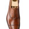 Zapatos y correa de cuero